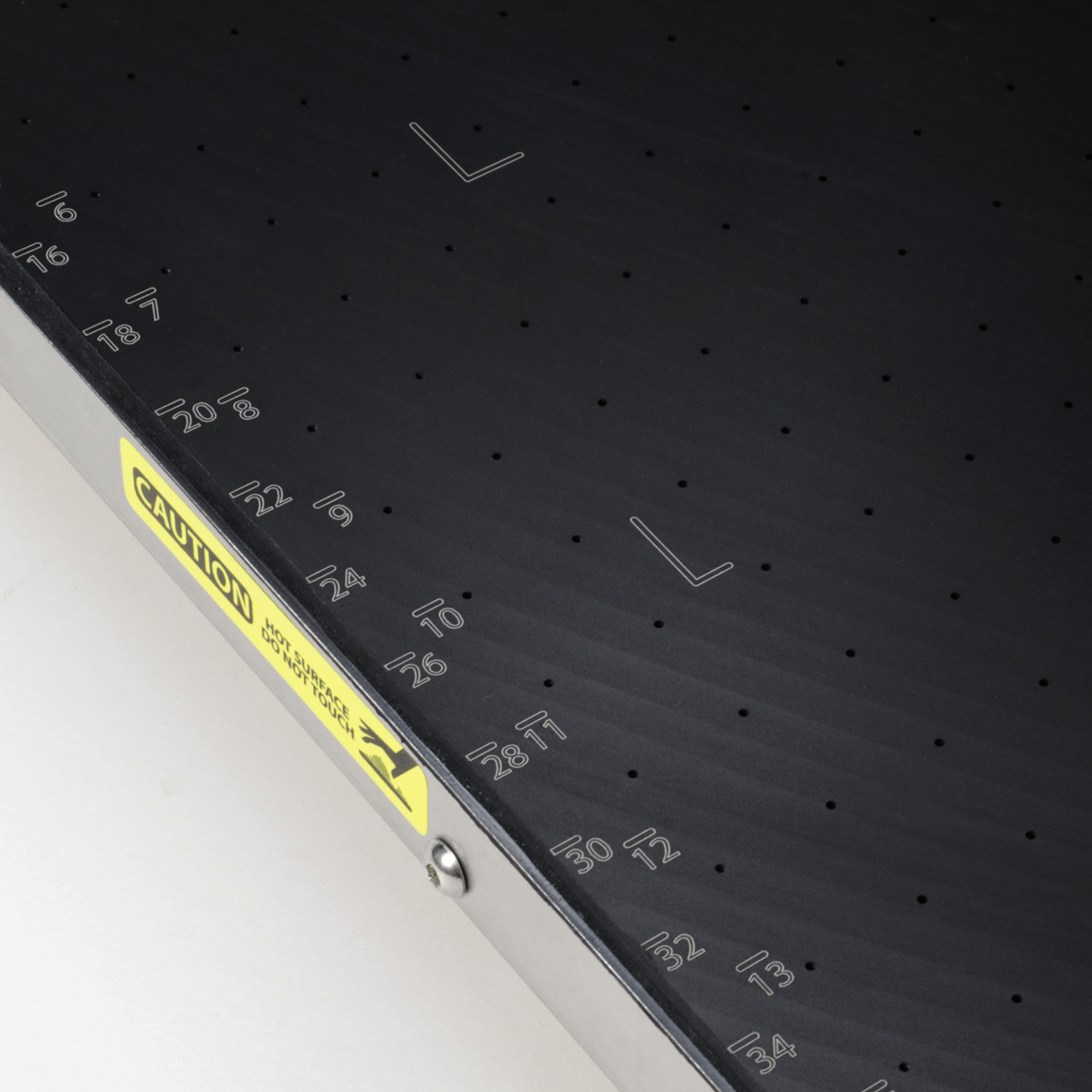 HEATED PERFORATED VACUUM BED FOR THIN FILM APPLICATION